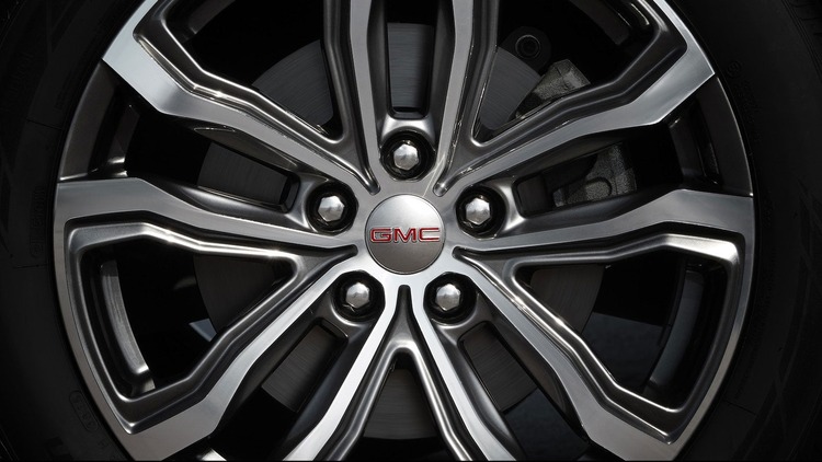 Close up view of a GMC branded tire